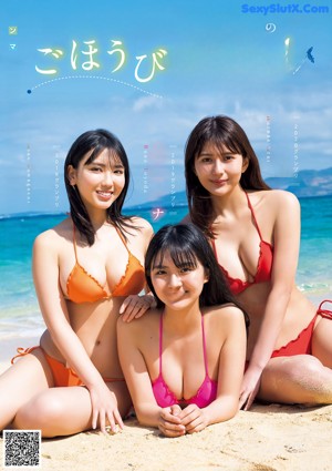 A group of women in bikinis standing next to a pool.