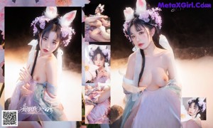 A woman in a bunny costume sitting on a rock.