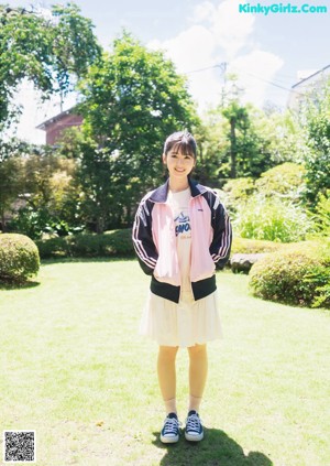 A magazine with a picture of a girl in a school uniform.